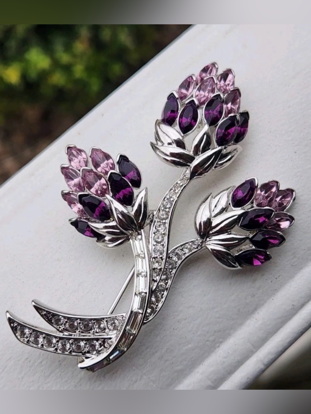 Nolan Miller Signed Thistle Purple Rhinestone Brooch Silvertone setting Pristine